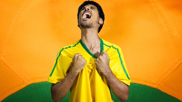 An iconic photograph of Pelé celebrating a goal during a FIFA World Cup match, wearing the Brazilian national team jersey, with a joyful expression, capturing the essence of his legendary status and contribution to Brazilian football.
