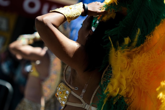 A colorful photograph of a samba school performing in the Rio de Janeiro Carnival, showcasing the rhythmic and vibrant African influence in Brazilian music.