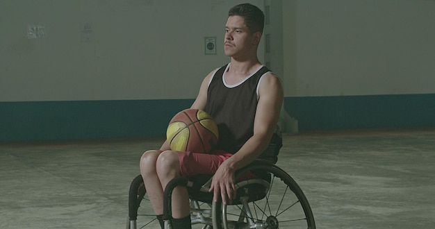A shot of a Brazilian Paralympic athlete in a wheelchair basketball game, dribbling the ball with skill and agility, showcasing the fast-paced nature of the sport.